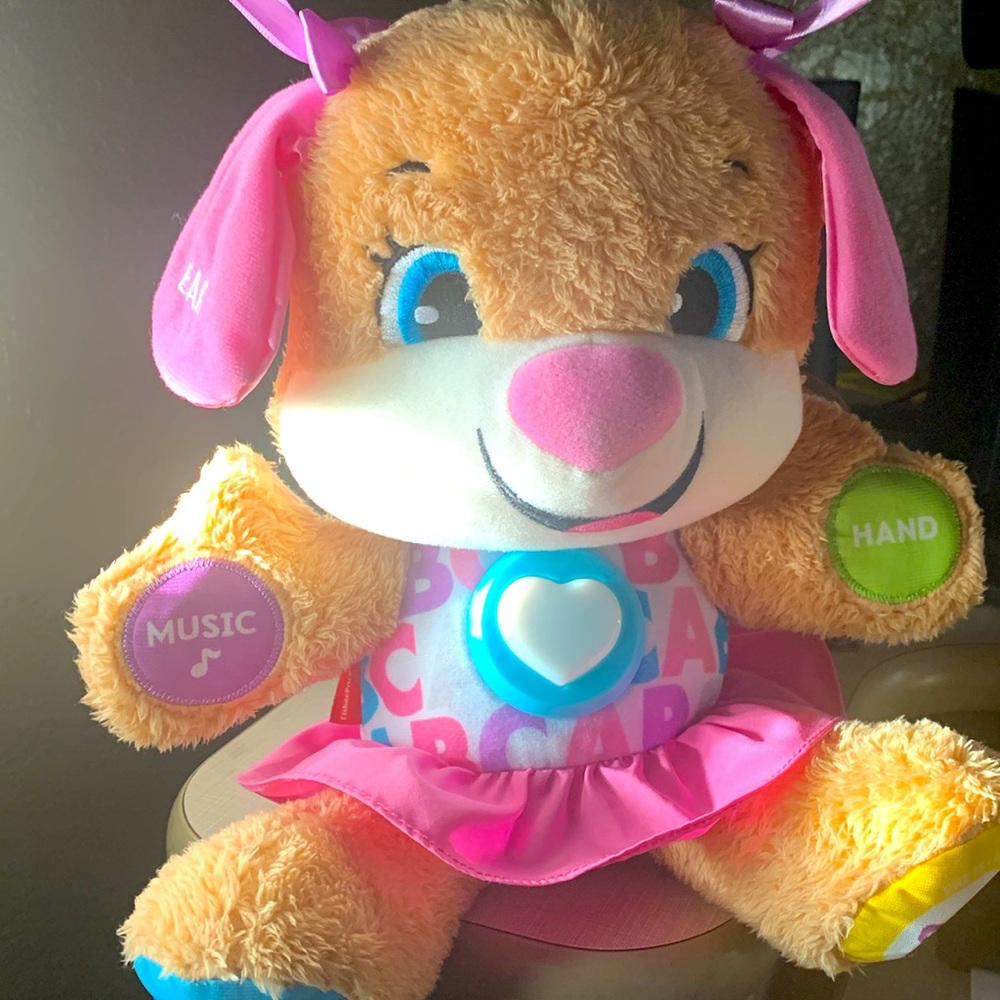 Fisher Price talking bear and sings too many sounds including ABCS